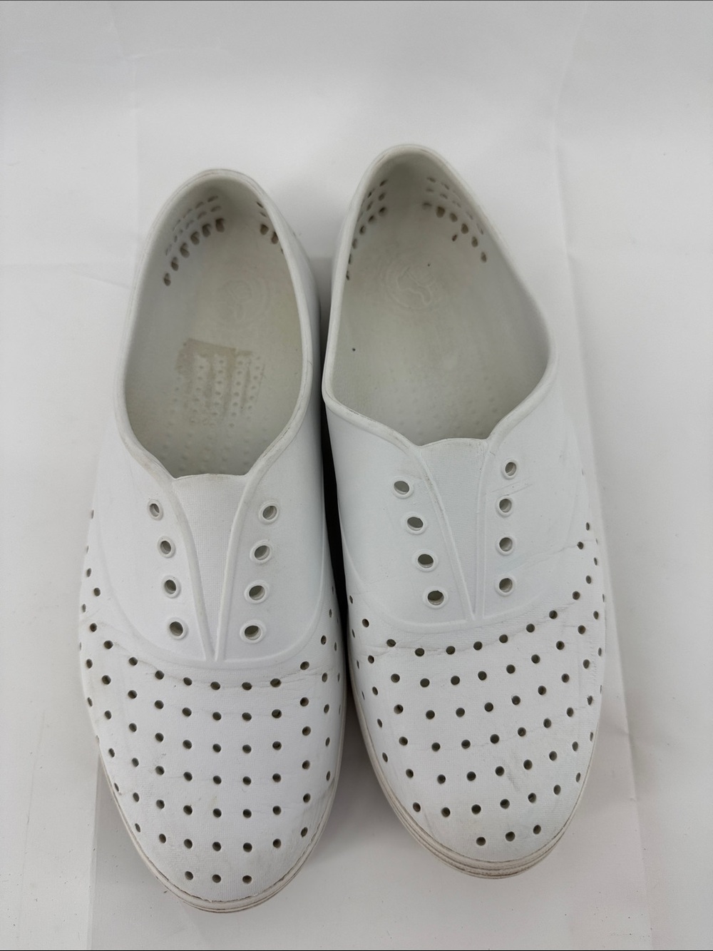 Native Ladies White Jefferson Slip-On Sneakers with Blue Logo